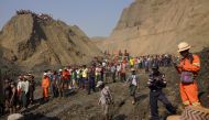 Local people look on in a jade mine where the mud dam collapsed in Hpakant, Kachin state, Myanmar April 23, 2019. Reuters
