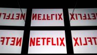 FILE PHOTO: This illustration picture shows the US Online Streaming giant Netflix logo displayed on a tablet in Paris.  AFP / Lionel BONAVENTURE