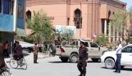Afghan security forces take guard after an explosion followed by gunfire in the ministry of information and technology of Afghanistan's main building, 20 April 2019, Kabul, Afghanistan. Sayed Khodaberdi Sadat - Anadolu 
