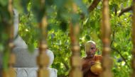 A Buddhist monk prays for the bomb blast victims at Kelaiya temple in Colombo on April 24, 2019, three days after a series of suicide attacks targeting churches and luxury hotels in Sri Lanka. AFP / Ishara S Kodikara 