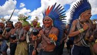 Indigenous demonstrators march in Brasilia on April 26, 2019 on the last day of a protest to defend indigenous land and rights.  AFP / Carl De Souza 