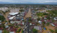 This aerial picture taken on April 27, 2019 shows a general view of submerged buildings after heavy rain caused flooding in Bengkulu on the Indonesian island of Sumatra. AFP / DIVA MARHA
