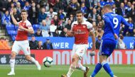Leicester City's English striker Jamie Vardy (R) scores their third goal during the English Premier League football match between Leicester City and Arsenal at King Power Stadium in Leicester, central England on April 28, 2019. / AFP / Lindsey PARNABY