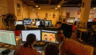 Employees work at the state-owned Parovoz animation studio in Moscow on February 1, 2019, which, with its Netflix contracts, is at the forefront of a resurgence of the country's animation industry. AFP / Mladen Antonov
 