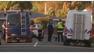 Police officers and vehicles are seen behind police cordon, in Christchurch, New Zealand in this still image taken from video April 30, 2019. TVNZ via Reuters TV