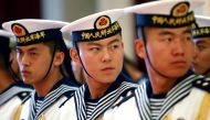 A military honor guard prepares to welcome U.S. Chief of Naval Operations Admiral Jonathan Greenert at the PLA Navy headquarters outside of Beijing, China July 15, 2014.  Stephen Shaver/Pool via Reuters