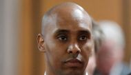 Former Minneapolis police officer Mohamed Noor walks out of the courthouse during a recess on the first day of opening arguments of his trial, where he is charged in the 2017 fatal shooting of 40-year-old Australian woman Justine Ruszczyk Damond, in Minne