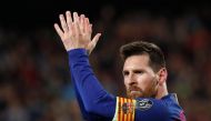 Barcelona's Lionel Messi celebrates scoring their third goal. Reuters/Susana Vera