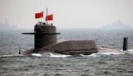 A Chinese Navy nuclear submarine takes part in an international fleet review to celebrate the 60th anniversary of the founding of the People's Liberation Army Navy in Qingdao, Shandong province April 23, 2009.  Guang Niu/Pool via Reuters
 