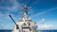 A P-8 Poseidon flies over the Arleigh Burke-class guided-missile destroyer USS Benfold (DDG 65) as part of information-gathering operations during Valiant Shield 2016 in the Philippine Sea September 16, 2016.  US Navy photo by Mass Communication Specialis
