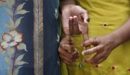 Child labourers hold each others hands after being rescued during a joint operation by police and a non-governmental organisation (NGO) on World Day Against Child Labour in New Delhi June 12, 2009. Reuters/Adnan Abidi