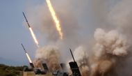 This picture taken on May 4, 2019 and released from North Korea's official Korean Central News Agency (KCNA) on May 5, 2019 shows rocket launchers firing during a test of weapons in an undisclosed location in North Korea. AFP PHOTO/KCNA VIA KNS