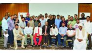 Trainees posing for a group photo after completing the programmes at Qatar Chamber recently.