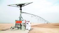 Senior officials switching on the first solar-powered irrigation system to be used for growing fodder.