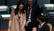 A 2018 file photo of New Zealand Prime Minister Jacinda Ardern as she walks back to her baby Neve and partner Clarke Gayford, after speaking at the Nelson Mandela Peace Summit during the 73rd UNGA in New York City, New York, US. Reuters/Carlo Allegri/File Photo