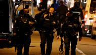 Police officers secure the area after a gunman held several people hostage in a newsagent store in the Blagnac suburb of Toulouse, France May 7, 2019. Reuters/Regis Duvignau