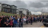 People wait outside near the STEM School during a shooting incident in Highlands Ranch, Colorado, U.S. in this May 7, 2019 image obtained via social media. SHREYA NALLAPATI/VIA REUTERS