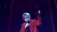 FILE PHOTO: Ed Sheeran accepts the award for global success at the Brit Awards at the O2 Arena in London, Britain, February 21, 2018. REUTERS/Hannah McKay/File Photo