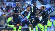 (L-R) Manchester City's Belgian defender Vincent Kompany, Brazilian striker Gabriel Jesus, Brazilian midfielder Fernandinho, English defender Kyle Walker celebrate at the final whistle of the English Premier League football match between Brighton and Hove
