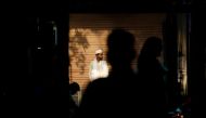 A man stands outside a polling station before casting his vote during the sixth phase of the general election, in the old quarters of Delhi, India, May 12, 2019. Reuters/Anushree Fadnavis 