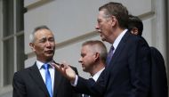 FILE PHOTO: China's Vice Premier Liu He listens to U.S. Trade Representative Robert Lighthizer as they exit the office of the U.S. Trade Representative following the second day of last-ditch trade talks in Washington, U.S., May 10, 2019. REUTERS/Leah Mill