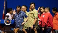 Philippine President Rodrigo Duterte waves to his supporters as he attends the Partido Demokratiko Pilipino-Lakas Bayan (PDP-LABAN) meeting in Manila on May 11, 2019 after endorsing the political party's senatorial candidates / AFP / Noel CELIS
 