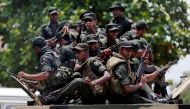 Sri Lankan soldiers patrol a road of Hettipola on top of an armored vehicle, after a mob attack in a mosque in the nearby village of Kottampitiya, Sri Lanka May 14, 2019. REUTERS/Dinuka Liyanawatte