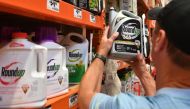 In this file photo taken on July 9, 2018, Customer Gary Harms shops for Roundup products at a store in San Rafael, California.  AFP / Josh Edelson 