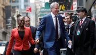 New York City Mayor Bill de Blasio and his wife Chirlane McCray, after announcing de Blasio's candidacy for the Democratic presidential nomination with a central campaign message, arrive at the Good Morning America show in New York City, U.S., May 16, 201
