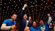Australia's Liberal Party supporters react during the results count at the Federal Liberal Reception at the Sofitel-Wentworth hotel in Sydney, Australia, May 18, 2019. AAP Image/Mick Tsikas