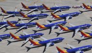 (FILES) In this file photo taken on March 28, 2019, Southwest Airlines Boeing 737 MAX aircraft are parked on the tarmac after being grounded, at the Southern California Logistics Airport in Victorville, California. AFP / Mark Ralston 