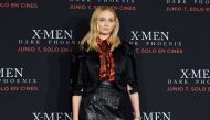English actress Sophie Turner poses for photographers before a press conference about the new film 