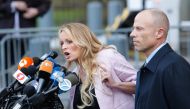 Stephanie Clifford also known as Stormy Daniels speaks outside US Federal Court with her lawyer Michael Avenatti in Lower Manhattan on April 16, 2018. AFP/Eduardo Munoz Alvarez