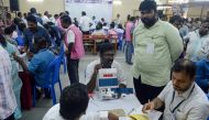 Indian election officials check an Electronic Voting Machine (EVM) on the vote results day for India's general election at a polling counting centre in Chennai on May 23, 2019. AFP / ARUN SANKAR