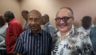 Papua New Guinea Prime Minister Peter O'Neil (R) and member of parliament Julius Chan (L) attend a function in Port Moresby on May 26, 2019. O'Neill annouced his resignation making way for Julius Chan to return as prime minister local media reported. / AF