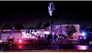 Emergency vehicles sit near a partially collapsed building after a tornado touched down in El Reno, Oklahoma, U.S., May 26, 2019 in this still image taken from social media video. Gale Vancampen via REUTERS