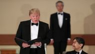 U.S. President Donald Trump speaks next to Japan's Emperor Naruhito during a state banquet at the Imperial Palace in Tokyo, Japan May 27, 2019. REUTERS/Jonathan Ernst