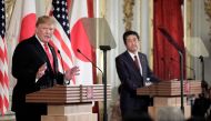 US President Donald Trump (L) speaks during a joint press conference with Japan's Prime Minister Shinzo Abe at Akasaka Palace in Tokyo on May 27, 2019. / AFP / POOL / Kiyoshi Ota