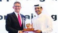 H E Saad bin Sherida Al Kaabi, the Minister of State for Energy Affairs and President and CEO of Qatar Petroleum (QP), handing the award to Andrew Faulkner, Qatar Shell Managing Director and Chairman, at a ceremony.
