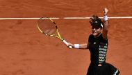 Britain's Johanna Konta celebrates after winning against Croatia's Donna Vekic at the end of their women's singles fourth round match on day eight of The Roland Garros 2019 French Open tennis tournament in Paris on June 2, 2019. / AFP / Philippe LOPEZ