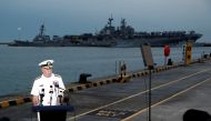Admiral Scott Swift, Commander of the U.S. Pacific Fleet, speaks at a news conference near the damaged USS John McCain and the USS America at Changi Naval Base in Singapore August 22, 2017. Reuters/Calvin Wong 