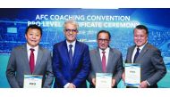 Saoud A Aziz M A Al Mohannadi, the Vice President of the Qatar Football Association poses for a picture along with Shaikh Salman bin Ebrahim Al Khalifa, the Asian Football Confederation President, Du Zhaocai, the Acting President of the Chinese FA and Koh