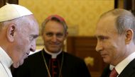 Russian President Vladimir Putin (R) meets Pope Francis during a private meeting at Vatican City, June 10, 2015. Reuters/Gregorio Borgia