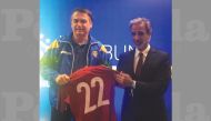 Sheikh Hamad bin Khalifa bin Ahmed Al Thani, President of the Qatar Football Association (QFA) presents a Qatari team jersey to Brazilian President Jair Bolsonaro ahead of the international friendly in Brasilia, on Wednesday.