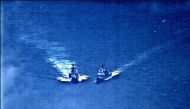 A surveillance photo shows the Russian naval destroyer Udaloy making what the U.S. Navy describes as an unsafe maneuver against the Ticonderoga-class guided-missile cruiser USS Chancellorsville in the Philippine Sea June 7, 2019. U.S. Navy/Handout via Reu