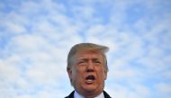 FILE PHOTO: US President Donald Trump speaks before boarding Air Force One at Shannon Airport in Shannon, Ireland, and fly to Normandy, France, to attend the 75th D-Day Anniversary.  AFP / MANDEL NGAN