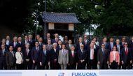 Japan's Finance Minister Taro Aso poses next to IMF Managing Director Christine Lagarde and Bank of Japan Governor Haruhiko Kuroda for a family photo during the G20 finance ministers and central bank governors meeting, in Fukuoka, Japan, June 8, 2019. Fra