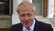 Conservative MP Boris Johnson leaves a house in London on June 7, 2019.  AFP / Daniel LEAL-OLIVAS