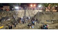 In this photo taken on June 10, 2019, an Indian rescue team launches an operation to recover the body of Fatehveer Singh, 2, who fell in a 33-meter (110-feet) deep well on June 6, in Sunam in the Punjab district of Sangrur. AFP / STR