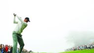  Tiger Woods of the United States plays a shot from the 14th tee during a practice round prior to the 2019 U.S. Open at Pebble Beach Golf Links on June 12, 2019 in Pebble Beach, California. Warren Little/Getty Images/AFP